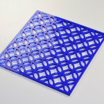 A laser cut blue pattern onto plastic made by Make Mode.