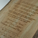 A laser cut poem into wood made by Make Mode.